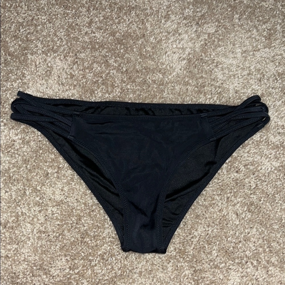 black bikini bottoms with hip cutout